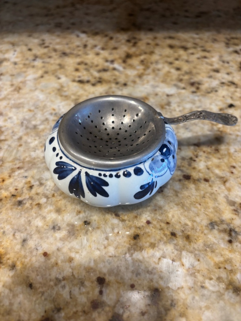 Vintage delft blue and white tea leaf strainer